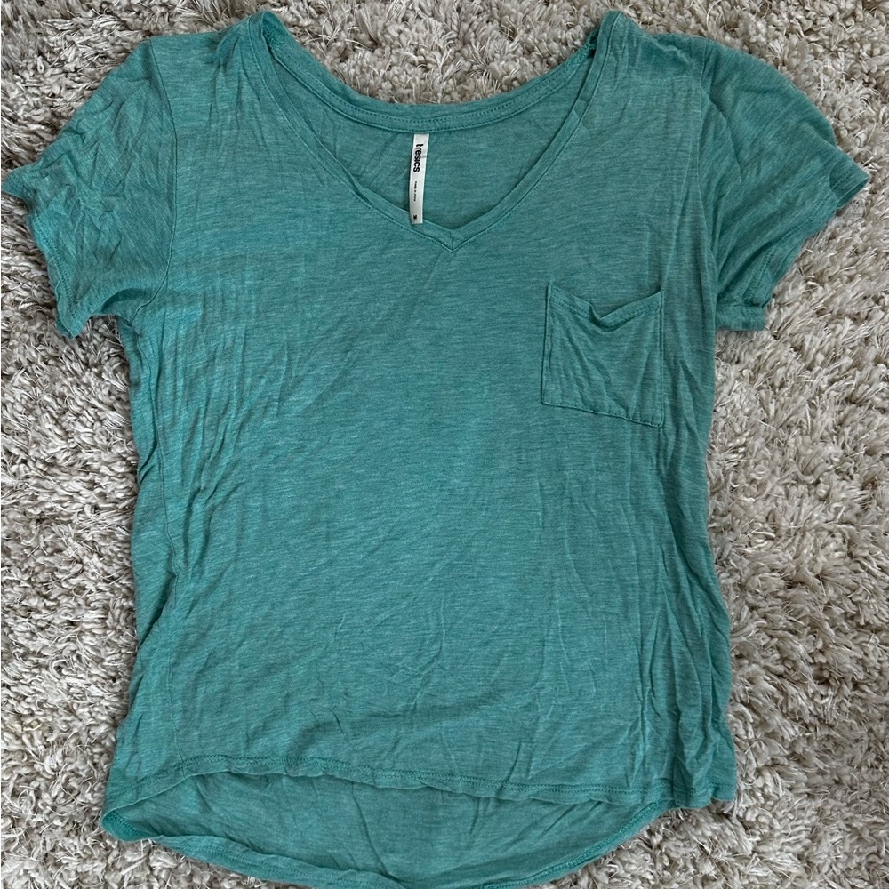 Tresics Teal T Shirt
Size M Women’s Juniors